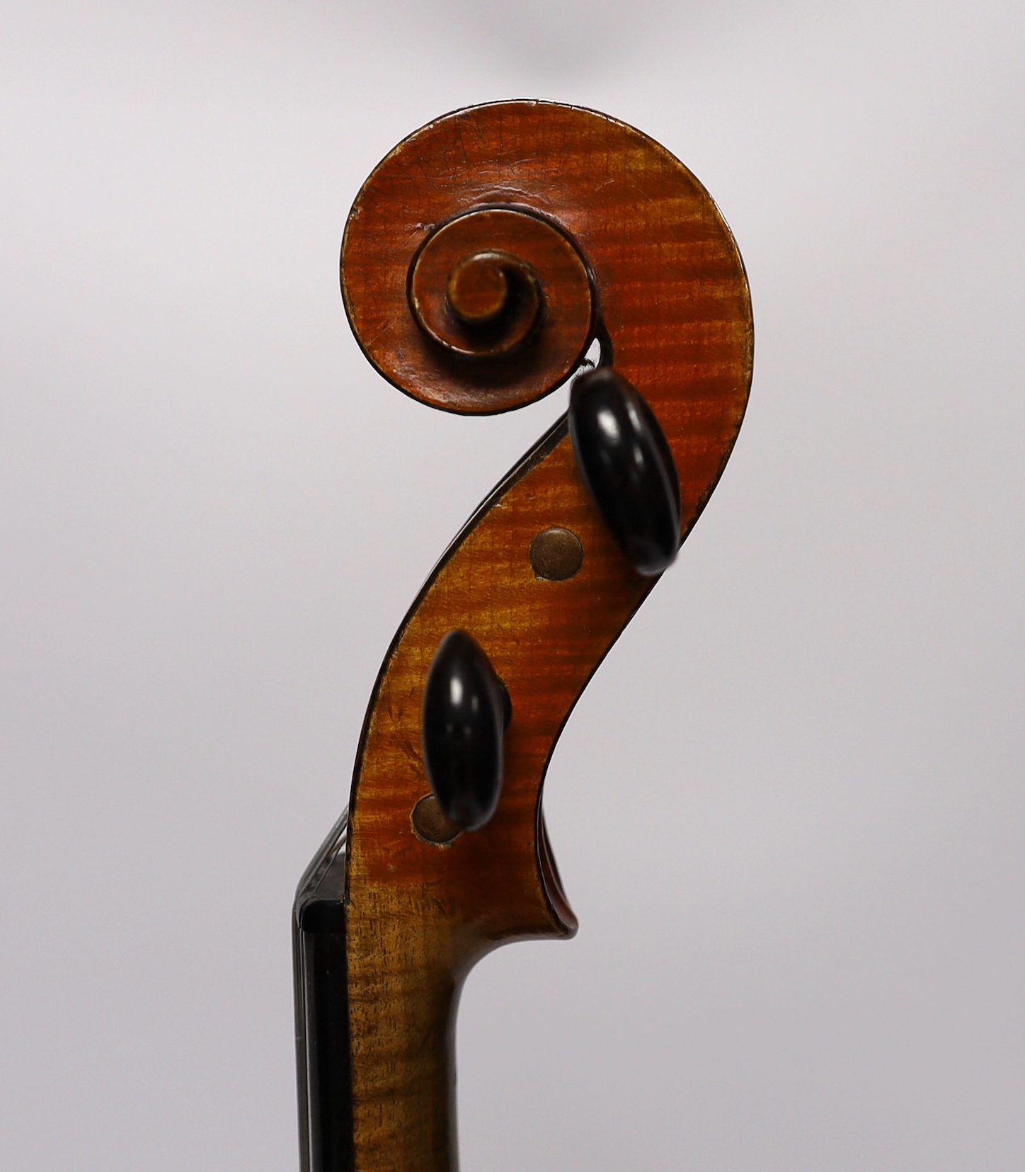 A cased late 19th/early 20th century French violin, bears Joseph Guarnerius label